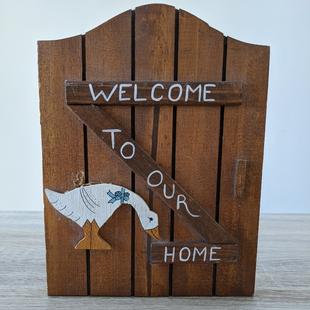 "Welcome to our home" wood goose sign